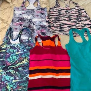 LULULEMON Tank Haul.  EUC.  Size 6.  Selling as a bundle.  Great mix of pattern.